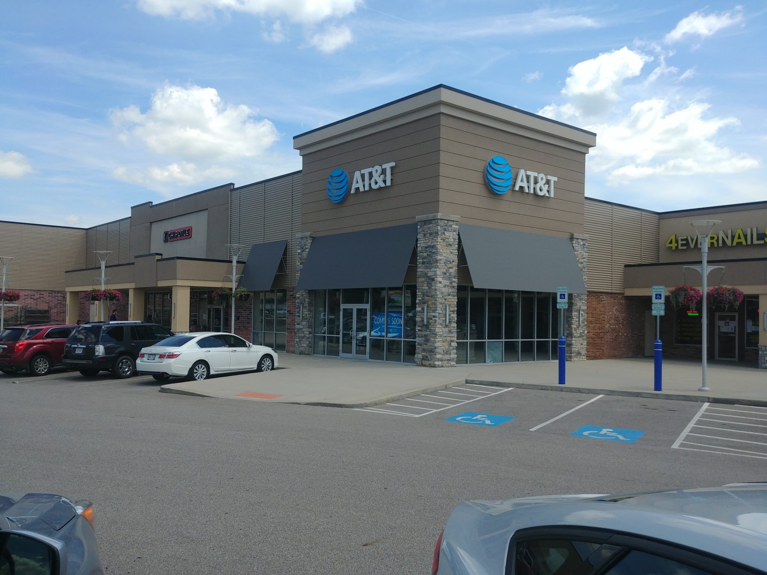 A photo of AT&T and Chipotle retail storefront